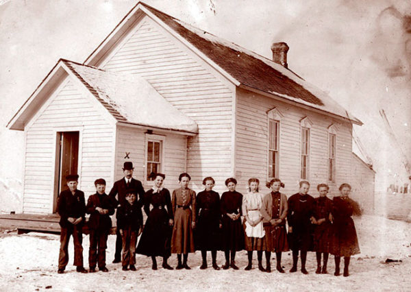 German immigrants at their school near the Wild Rice River, Hankinson, North Dakota, ca. 1910. 
