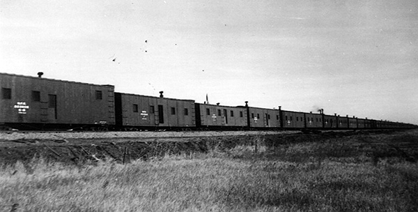 Internees at Fort Lincoln alien internment camp, released to work on North Dakota railroad lines under strict guard, lived in boxcars