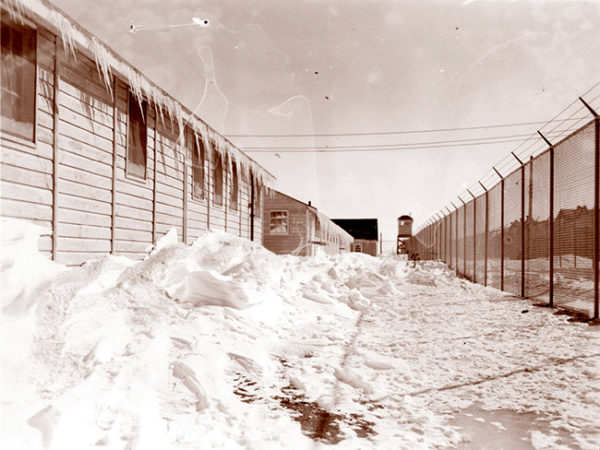 Temporary barracks at Fort Lincoln alien internment camp in North Dakota winter 1942-43